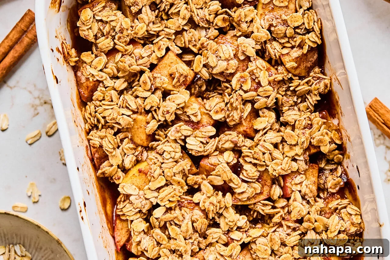 Protein-Packed Apple Crisp 7 The protein crisp assembled with the oat topping spooned over the apples, ready for baking.