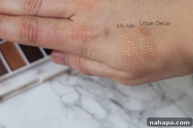 A hand with different makeup colors rubbed on it.