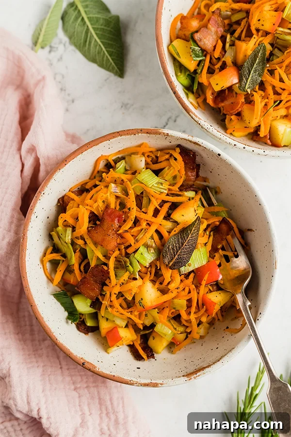 Sweet and Savory Whole30 Paleo AIP Carrot Apple Bacon Hash 5 Breakfast hash served in bowls ready to eat, with crispy sage garnish