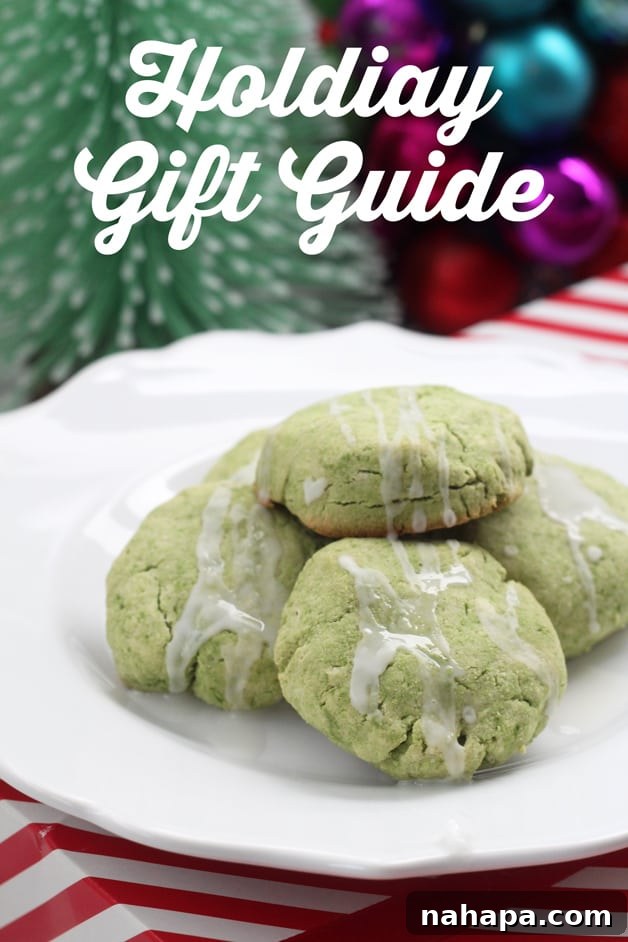 Paleo Holiday Gift Guide 2 A plate of festive green cookies with frosting, beneath text that reads 'holiday gift guide' in a warm, inviting font. The image captures the joyful and delicious spirit of the holiday season.
