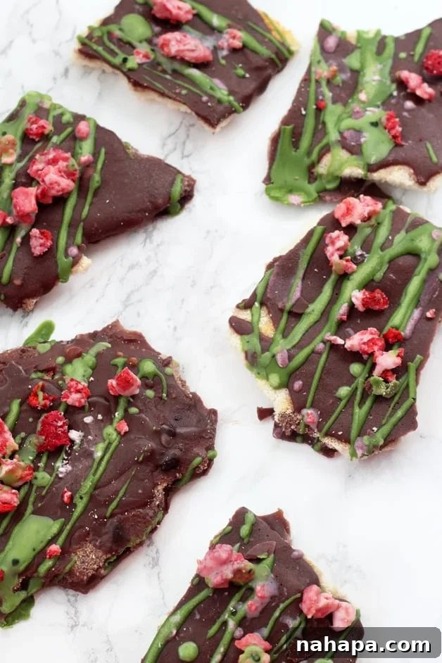 Paleo AIP Holiday Toffee Bars 5 Four pieces of paleo Christmas crack laying out on a counter.