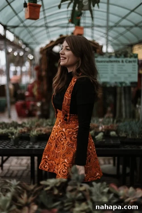 Michelle wearing a stylish 1960s jumper dress, a single-piece garment.