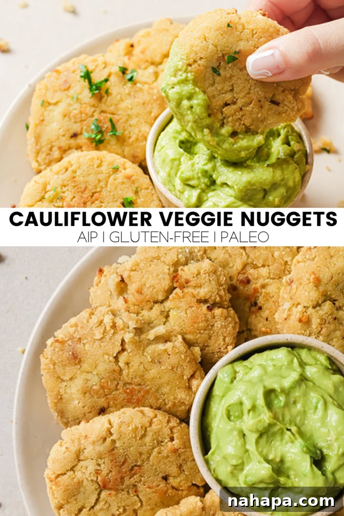 A wider shot of cauliflower veggie nuggets on a plate with fresh ingredients.