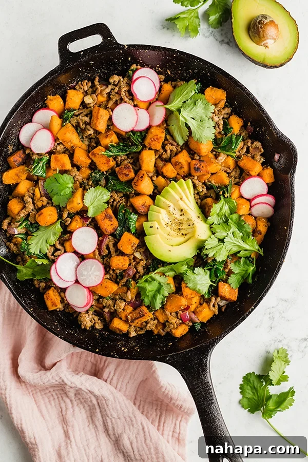 Wholesome Mexican Breakfast Skillet Paleo Whole30 AIP Egg Free 5 Four servings of Mexican Breakfast Skillet garnished with avocado and cilantro