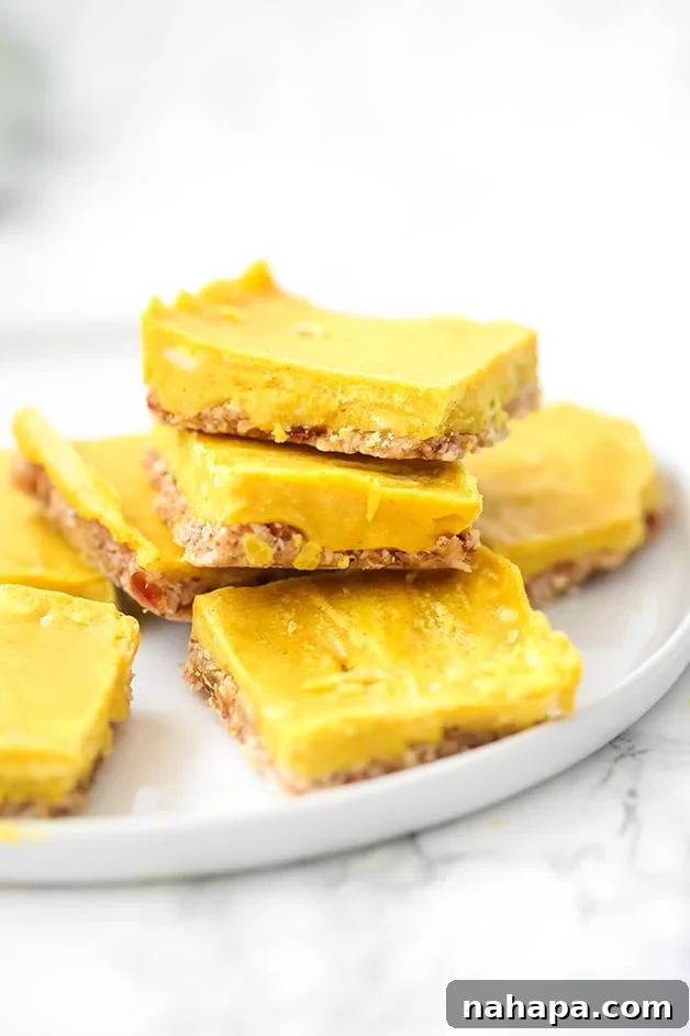 A white plate with seven golden anti-inflammatory turmeric bars on it, ready to be enjoyed as a healthy and vibrant snack.