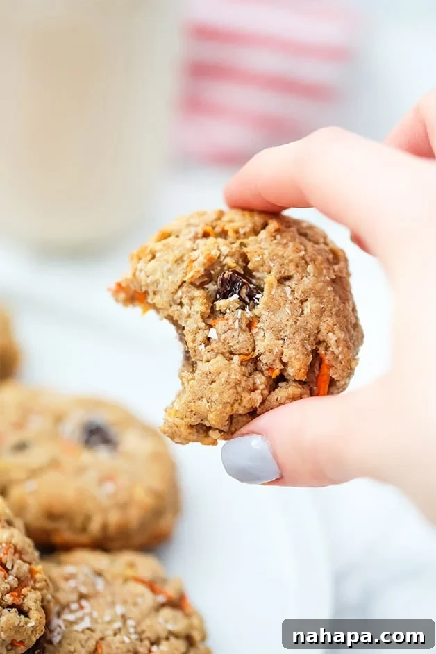 Close-up of a stack of fluffy Carrot Cake Protein Cookies, showing their soft texture.