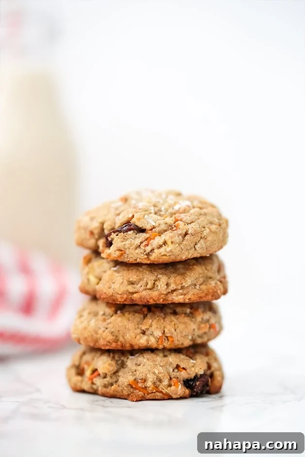Several Carrot Cake Protein Cookies arranged on a plate, showcasing their inviting appearance.