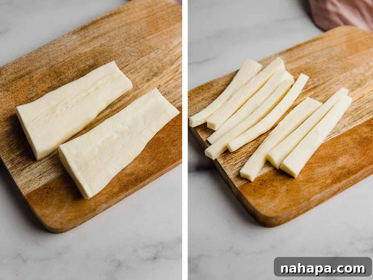 Raw parsnips meticulously chopped into uniform fry-like sticks on a cutting board, ready for seasoning.