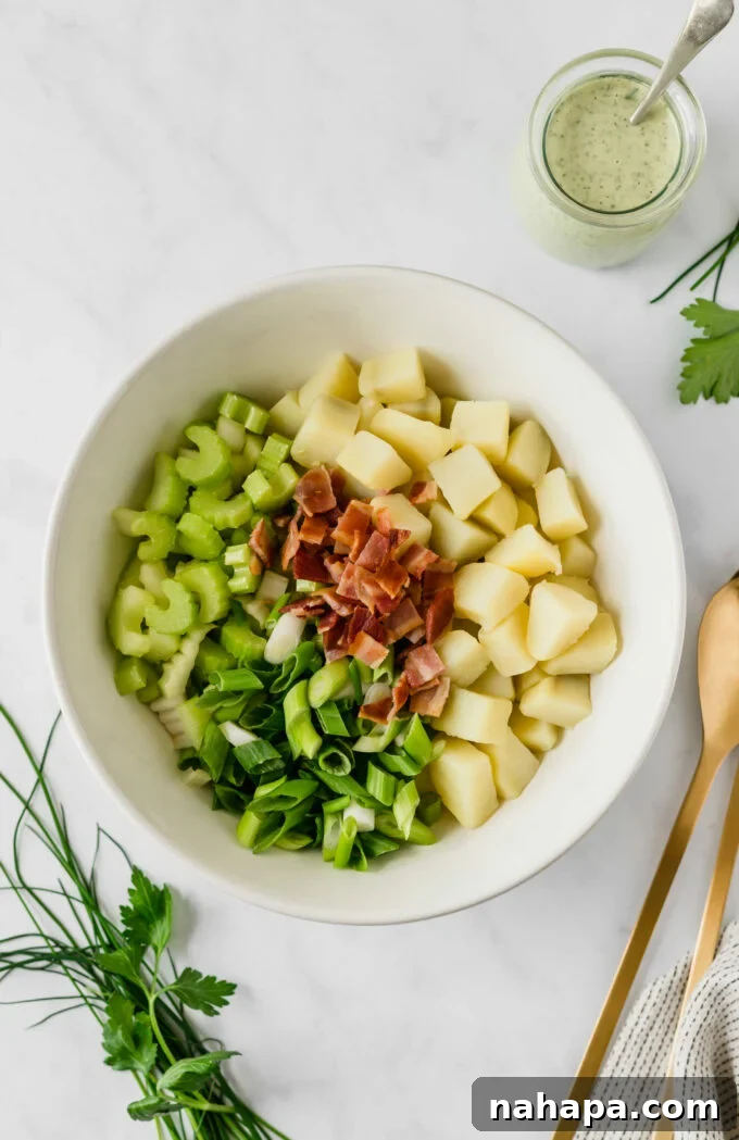 Wholesome Bacon Ranch Sweet Potato Salad 3 Freshly chopped sweet potatoes, crispy bacon, and vibrant green celery and onions, artfully arranged before being mixed into a delectable bacon ranch sweet potato salad.