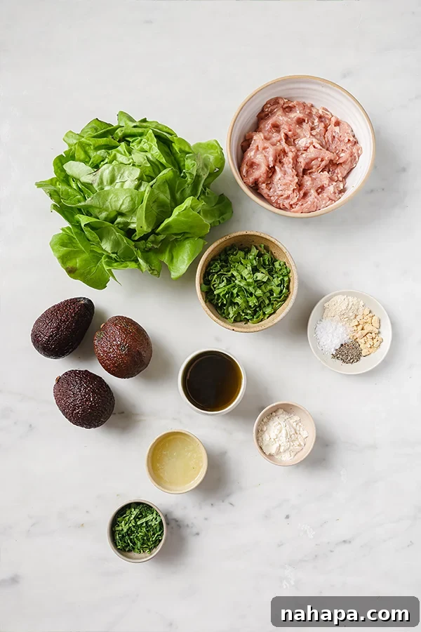 Close-up of a grilled Spinach Avocado Chicken Burger in a lettuce wrap
