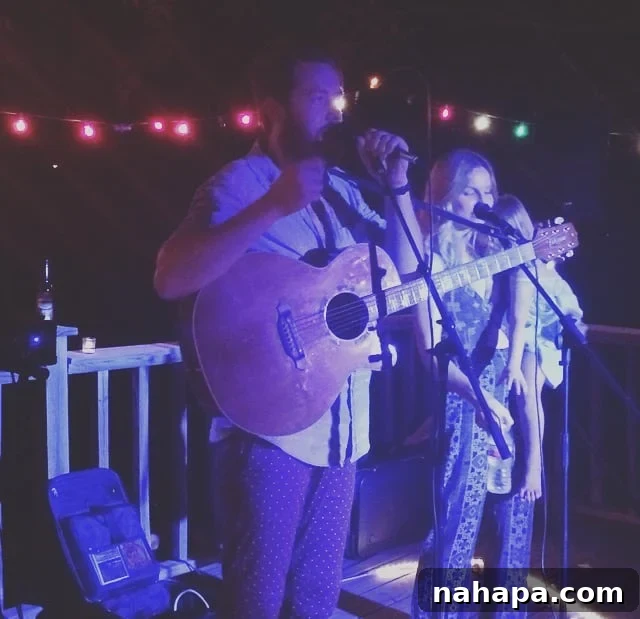 Labor Day Weekend Highlights 4 Musicians Katie and Aaron of Pilgrim performing at a house concert.