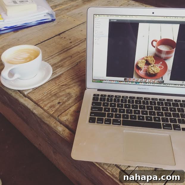 Labor Day Weekend Highlights 8 A cozy coffee shop setting with a laptop and coffee.