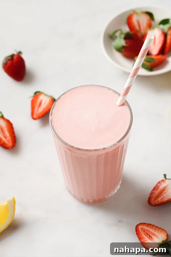 Velvety Frozen Pink Lemonade Paleo AIP Treat 2 Creamy Frozen Pink Lemonade in a glass