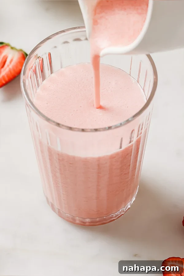 Velvety Frozen Pink Lemonade Paleo AIP Treat 4 Pouring Creamy Frozen Pink Lemonade
