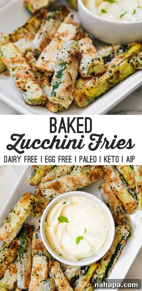 A vibrant, eye-level shot of crispy baked zucchini fries, some with visible seasoning, hinting at their delicious flavor and perfect crunch. Ideal for a Pinterest pin.