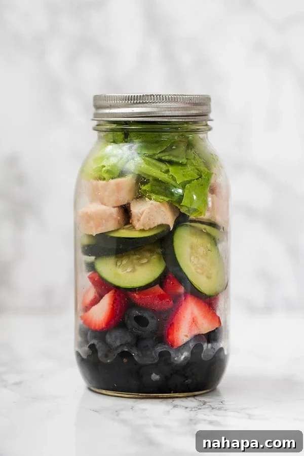 Streamline Your Diet 5 Paleo Whole30 AIP Mason Jar Salads 5 Mason jar berry chicken salad with balsamic dressing, blueberries, strawberries, cucumber, chicken, and romaine
