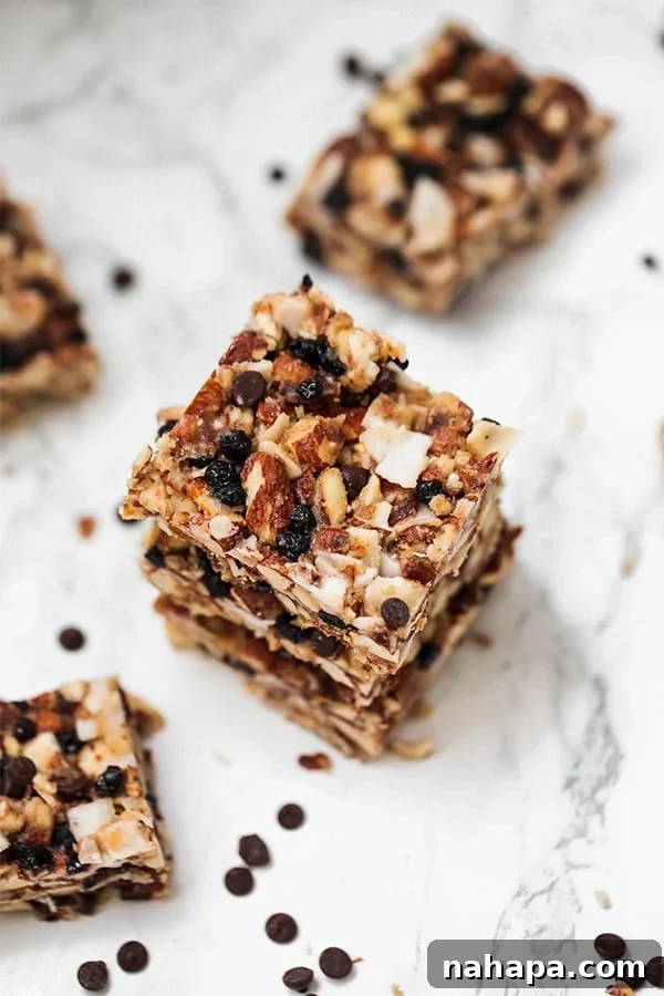 A beautiful overhead shot of granola bars with scattered chocolate chips, ready to be served