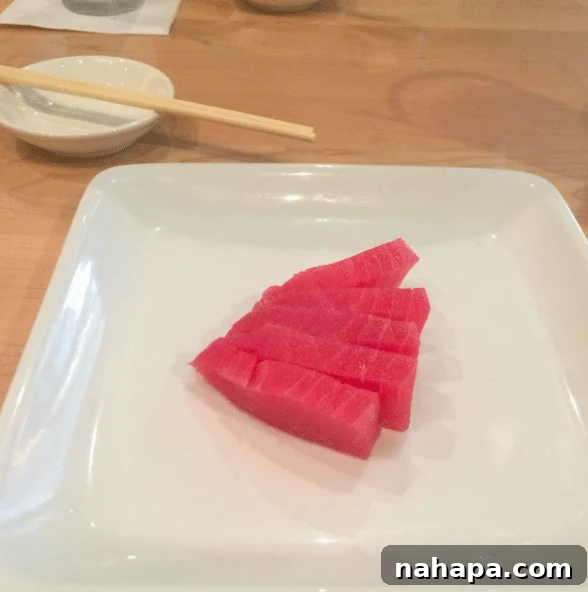 The Weekend Unfolds 10 Sushi plate with tuna sashimi and ginger, ready for a healthy lunch.