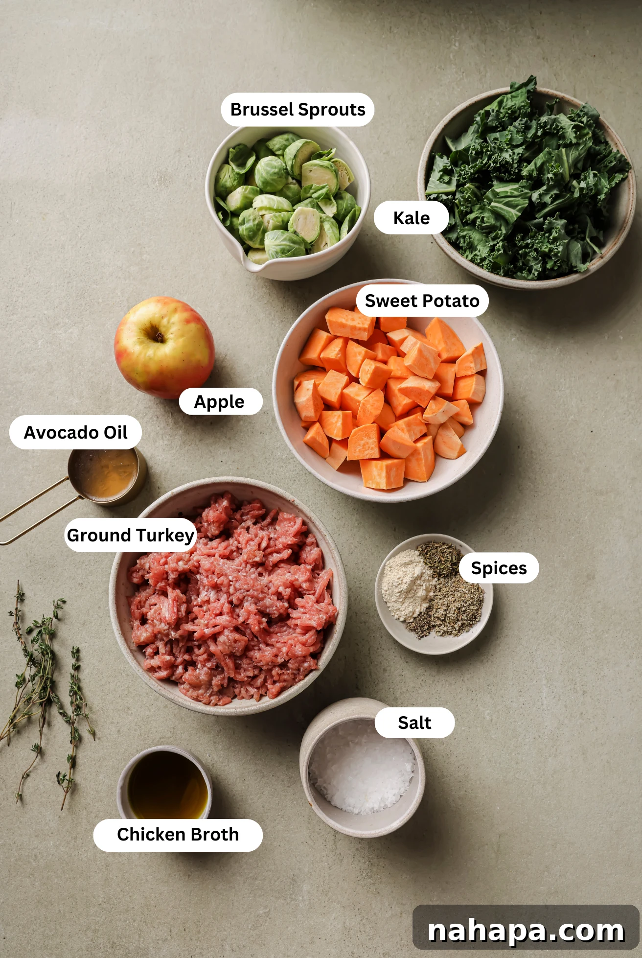 All the fresh ingredients for turkey and sweet potato breakfast hash meticulously arranged before cooking.