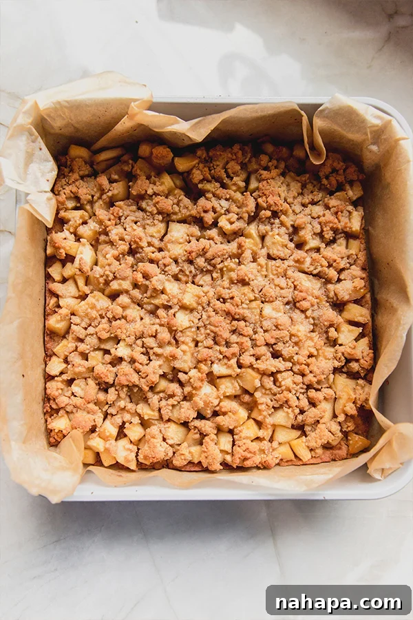 Freshly baked Paleo Apple Pie Bars, golden and inviting.