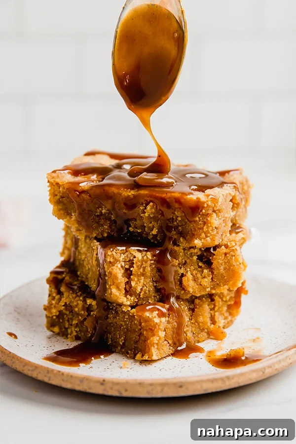 Decadent salted caramel pumpkin blondies, a perfect fall dessert with rich flavors