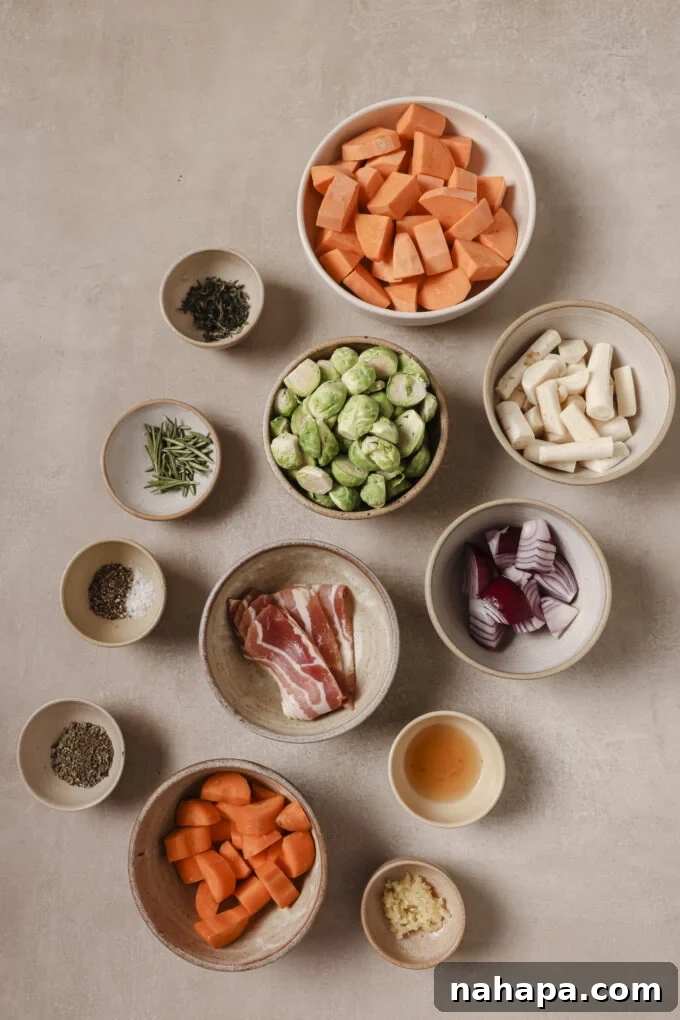 Bountiful Harvest Veggie Hash 3 Various chopped ingredients for harvest vegetable hash, including sweet potato, carrots, parsnips, Brussels sprouts, red onion, bacon, and fresh herbs, arranged in separate bowls on a wooden surface.