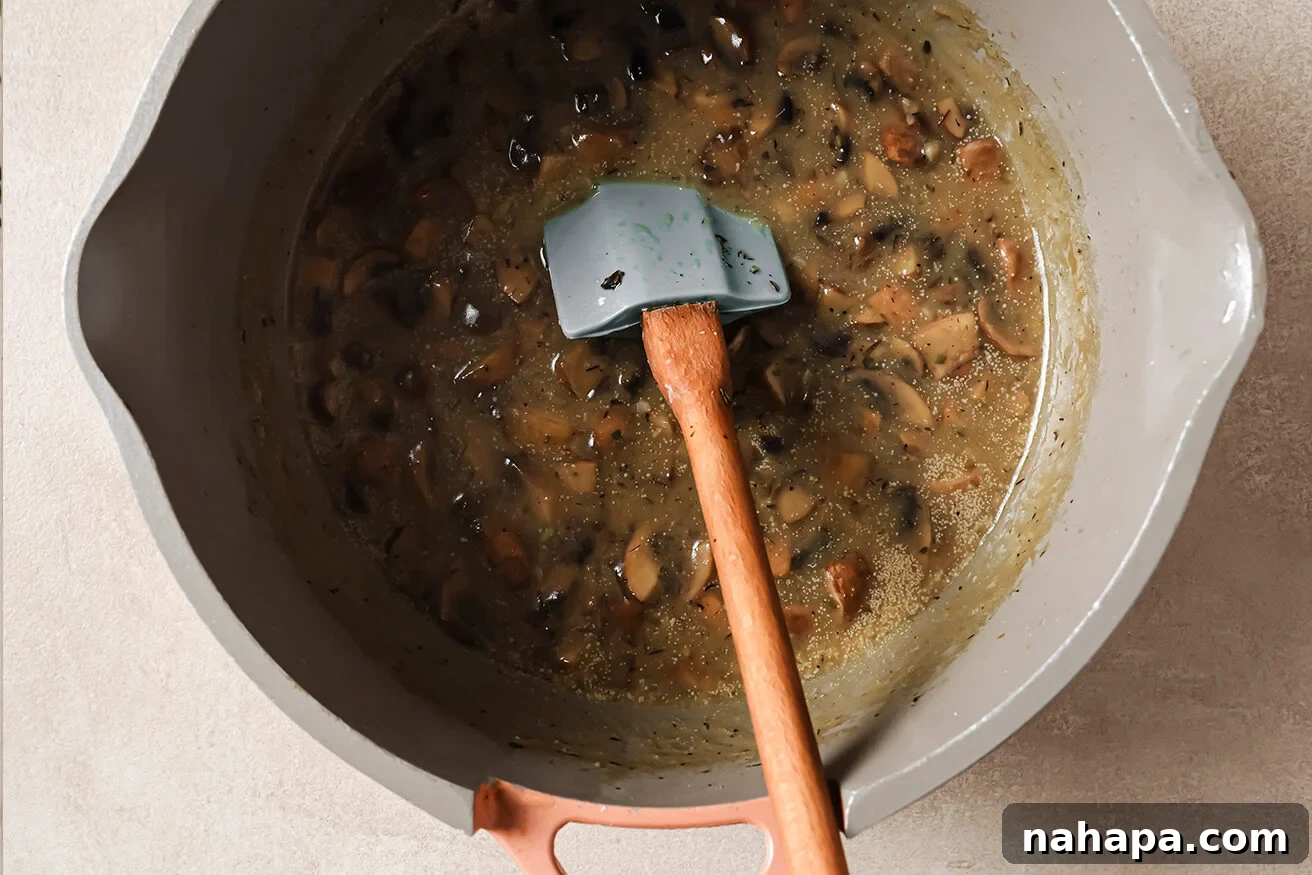 Comforting Gluten Free Green Bean Bake 4 Mushrooms and broth simmering in a pot.
