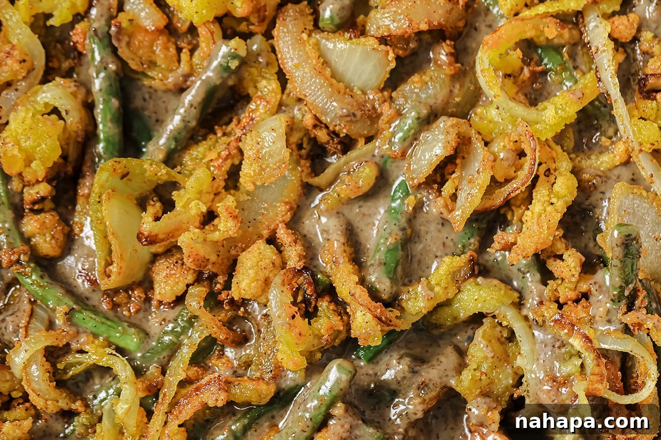 Comforting Gluten Free Green Bean Bake 9 Green bean casserole topped with fried onions.