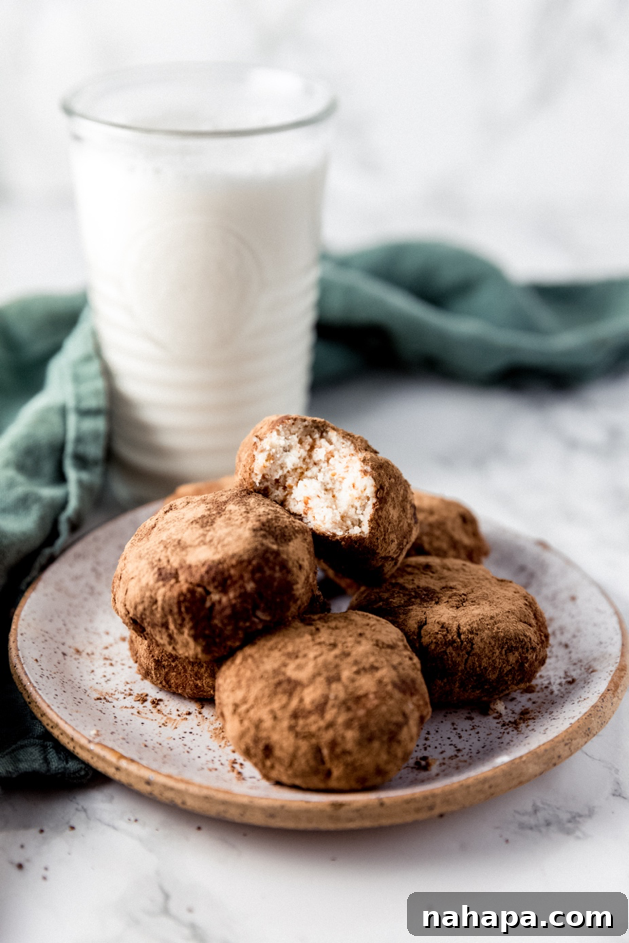 A close-up shot of unsweetened Baker's Corner Baking Cocoa powder, a key ingredient for rich chocolate flavor in no-bake treats.