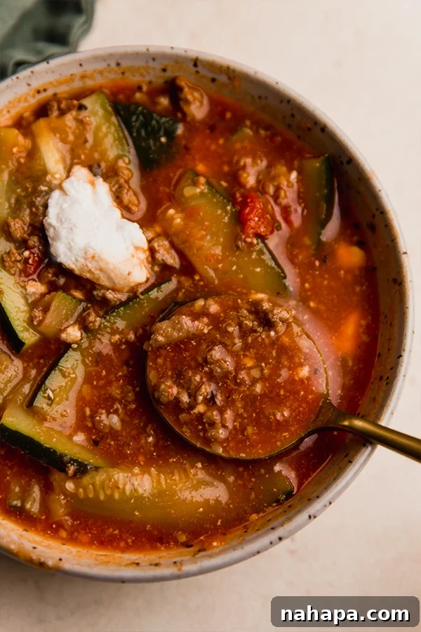 Paleo Lasagna Soup: Clean Eating Comfort 2 Delicious bowl of Paleo Lasagna Soup, garnished with fresh herbs and dairy-free ricotta