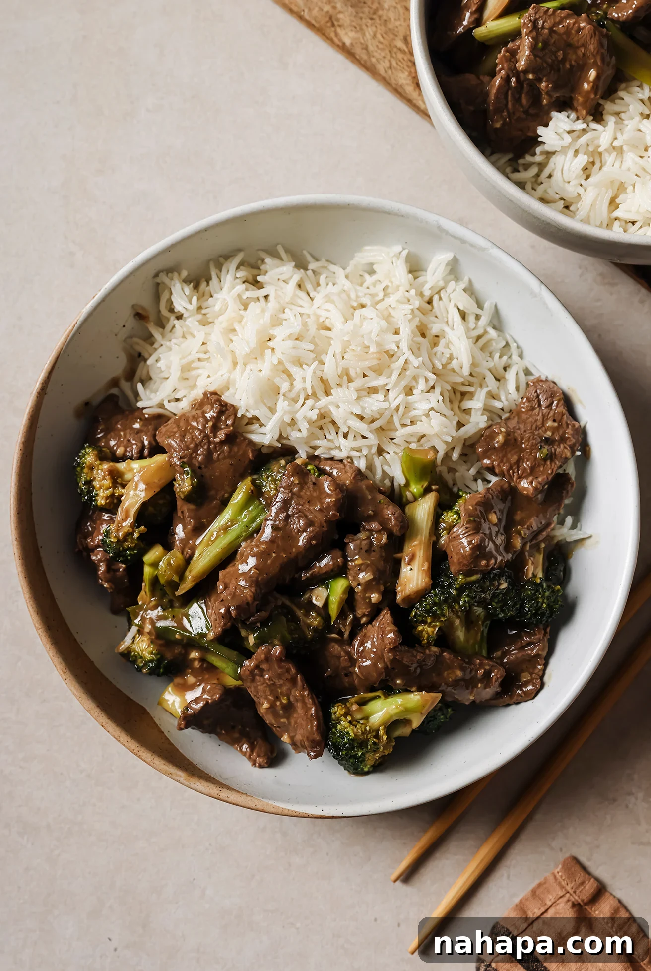 Gluten free mongolian beef in a bowl paired with rice.