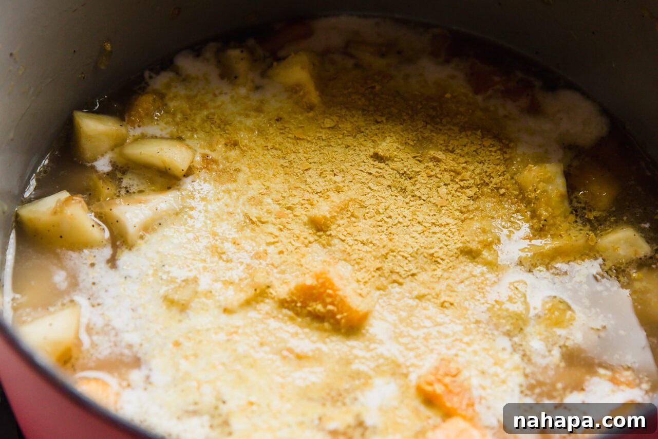 Creamy Cashew-Free Vegan Queso 5 Vegan queso ingredients in a pot before simmering.