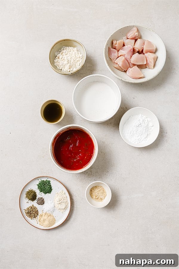 Ingredients for healthy chicken nuggets laid out on a table