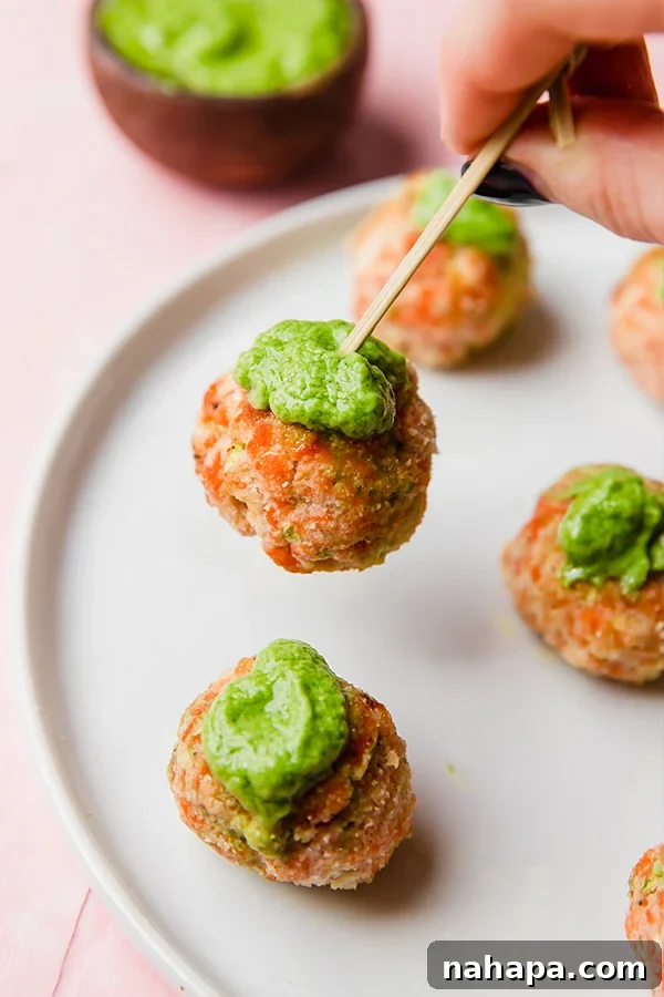 Salmon Meatballs served with a green sauce