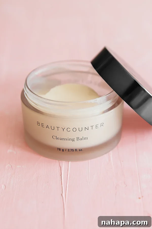 Close-up of Beautycounter Cleansing Balm in its elegant packaging, emphasizing its luxurious texture and beneficial ingredients.