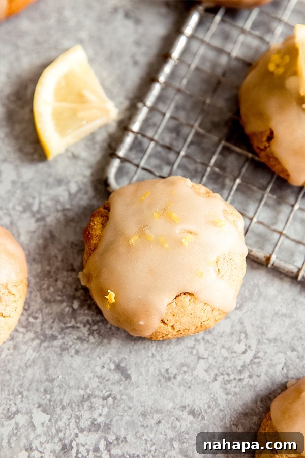Delicious Paleo Lemon Cookies arranged on a cooling rack, showcasing their golden hue and rustic texture.