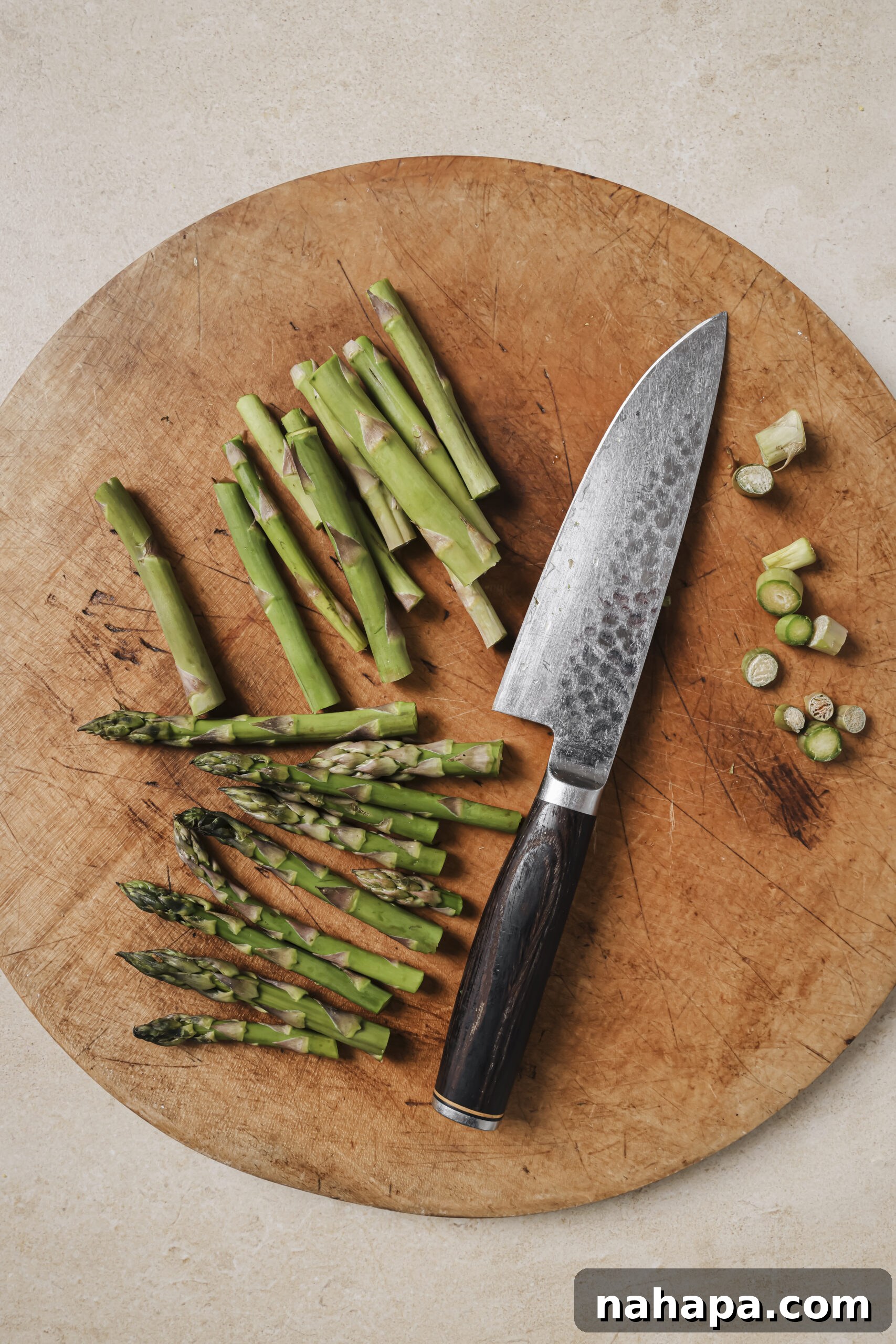 Asparagus cooking in a pan.