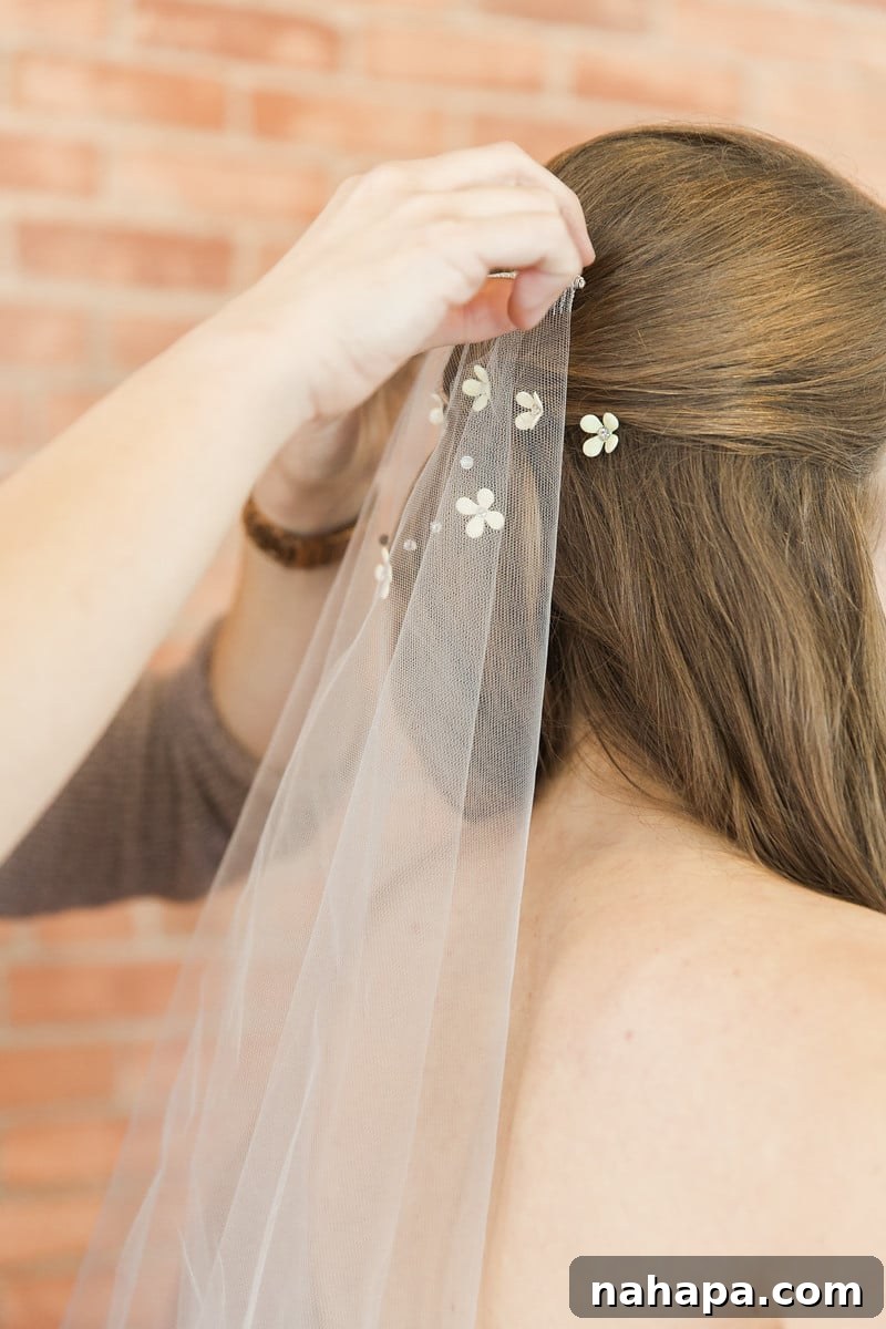 A Paleo Perfection: Our Wedding Crepe Cake and Unforgettable Day 4 Bride wearing custom-painted yellow veil and accessories.