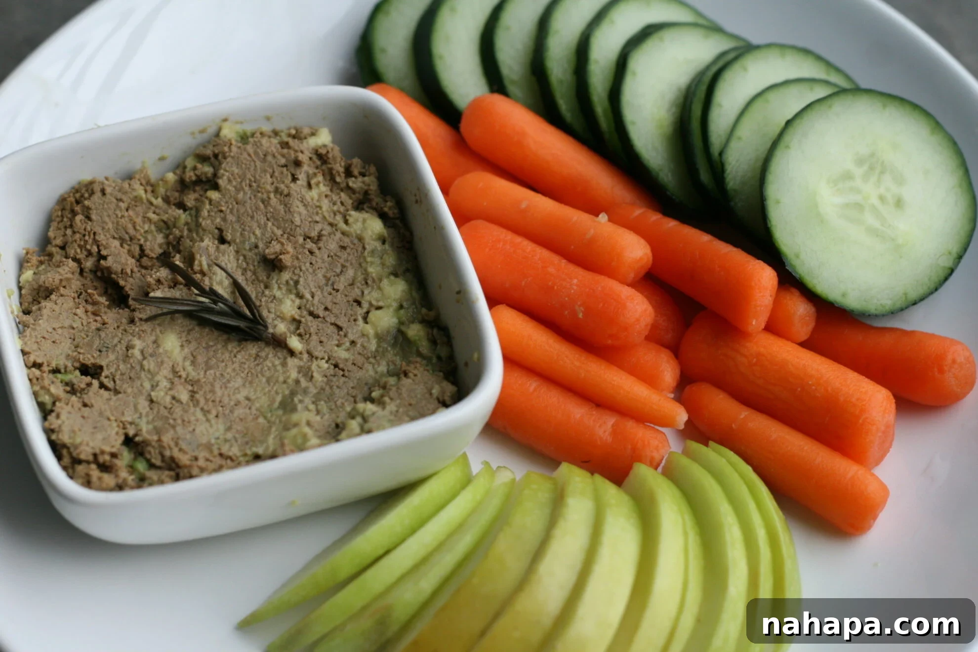 Nutrient Dense Avocado Beef Liver Pâté (paleo and AIP) served with a side of fresh, crisp vegetables.