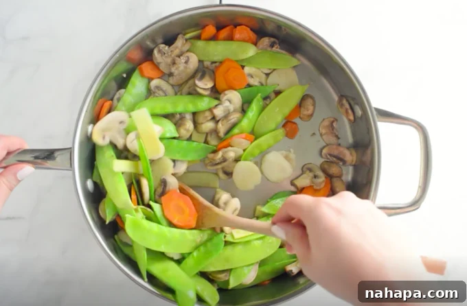 Cooking vegetables for Moo Goo Gai Pan