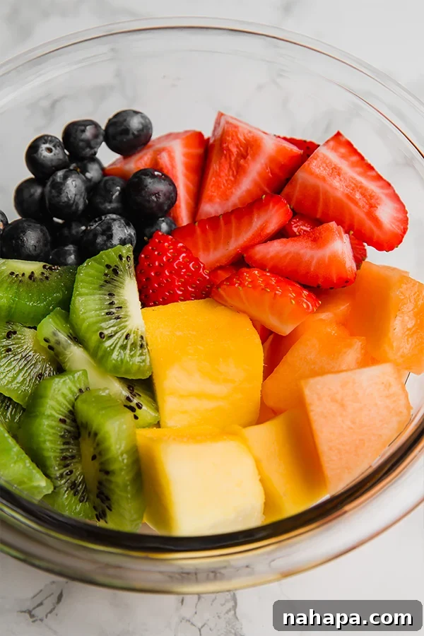 a close up of the honey lime mint fruit salad