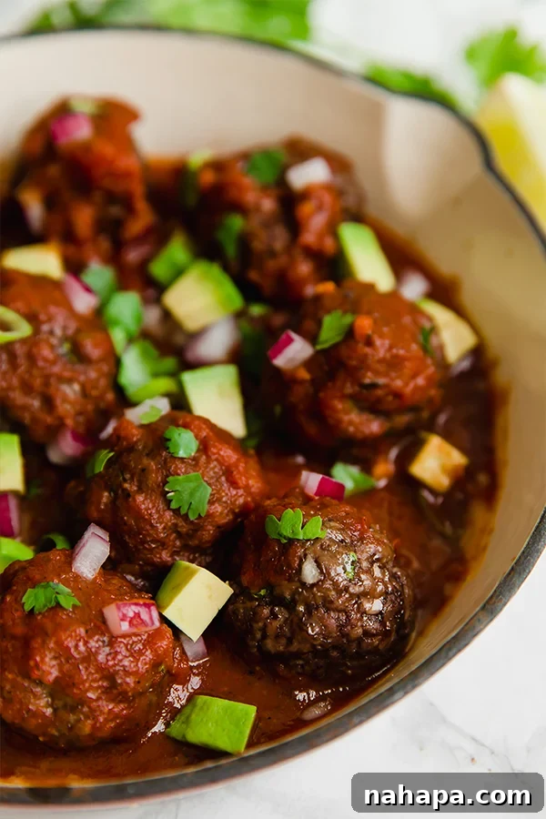 Enchilada Meatball Skillet ready to be enjoyed.