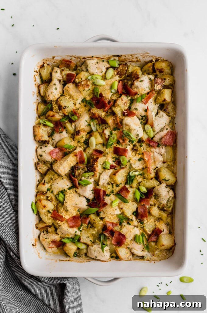 Savory Chicken Bacon Ranch Casserole, ideal for Paleo, Whole30, and AIP diets, featuring chicken, bacon, and ranch dressing over sweet potatoes.