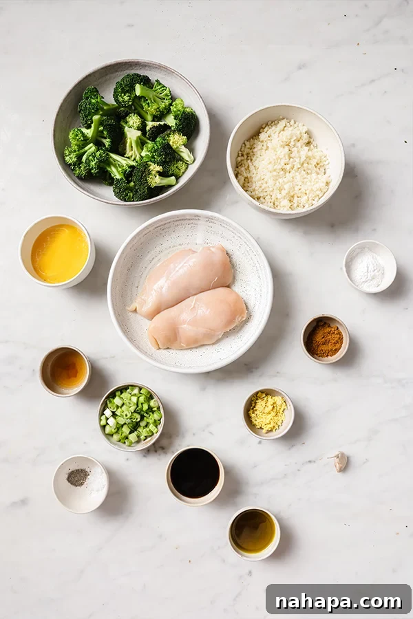 Paleo Whole30 AIP Orange Chicken Make Ahead Meals 3 Ingredients for healthy orange chicken meal prep including chicken, broccoli, cauliflower rice, and sauce components
