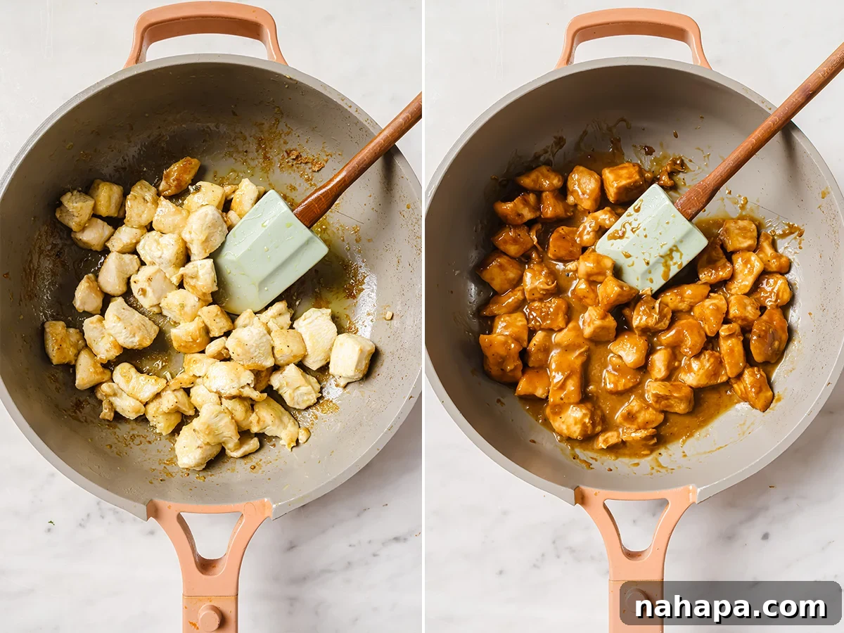 Paleo Whole30 AIP Orange Chicken Make Ahead Meals 4 Cooked orange chicken simmering in the pan with a thickened, glossy sauce