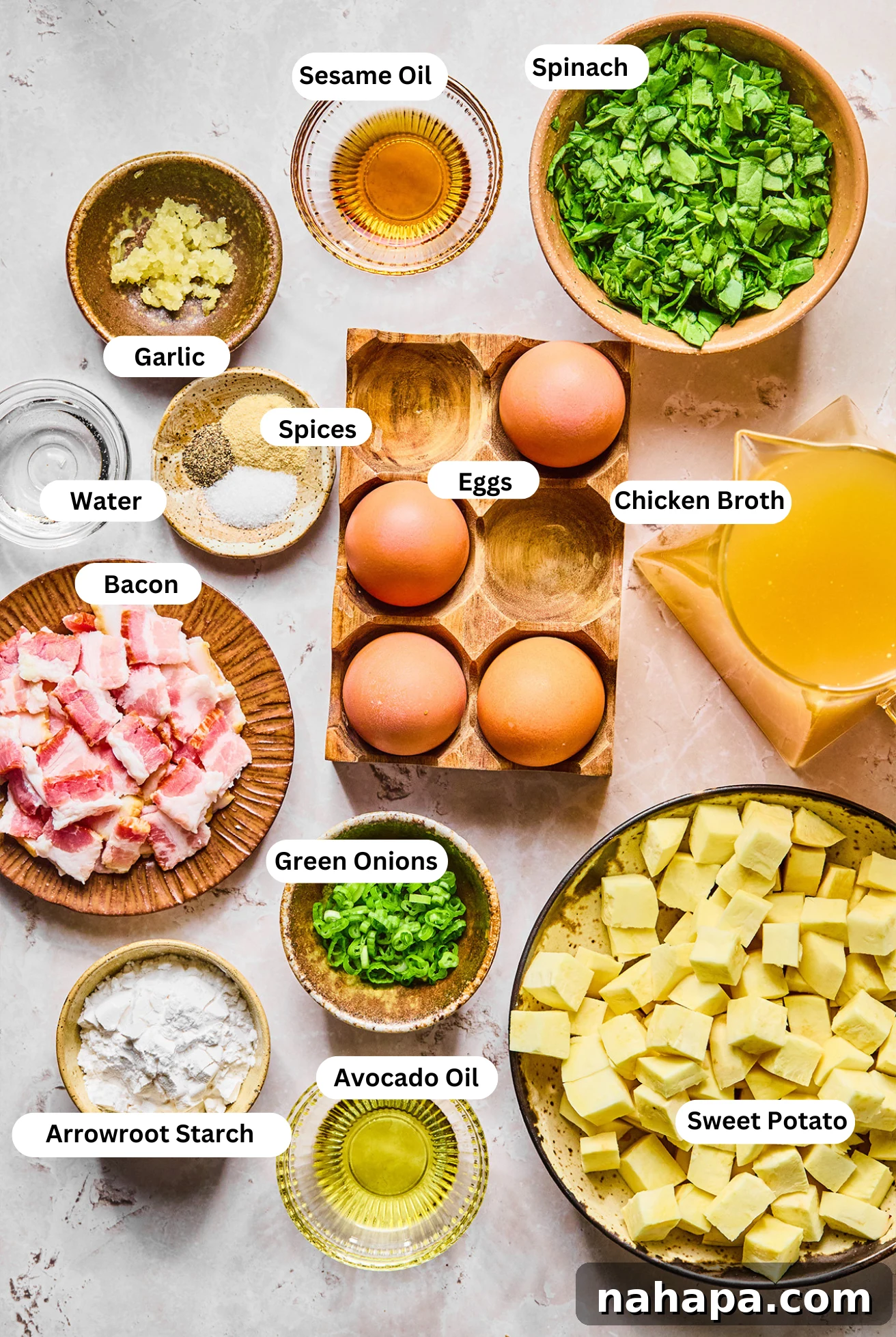 All the ingredients needed for breakfast egg drop soup in bowls before cooking begins.