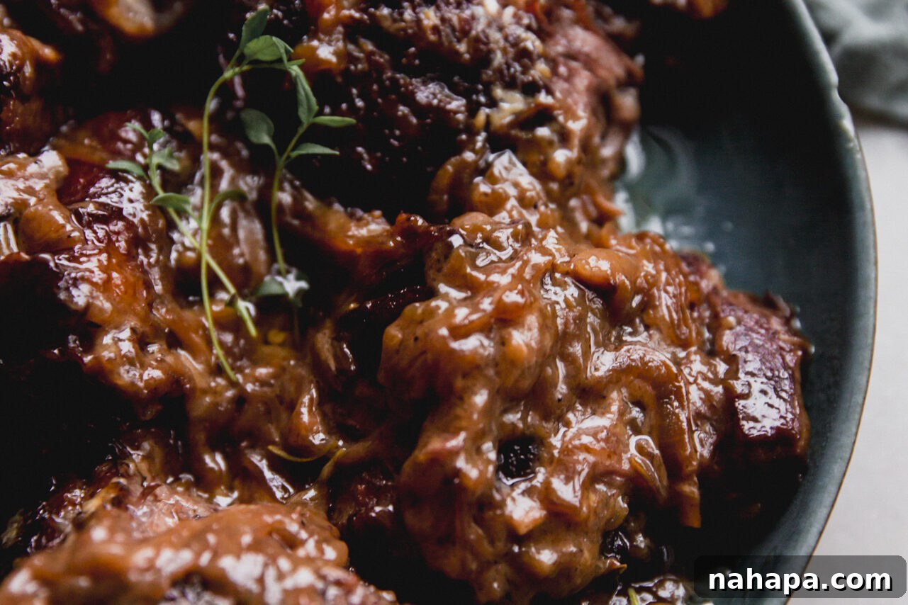 French onion short ribs in a serving bowl.