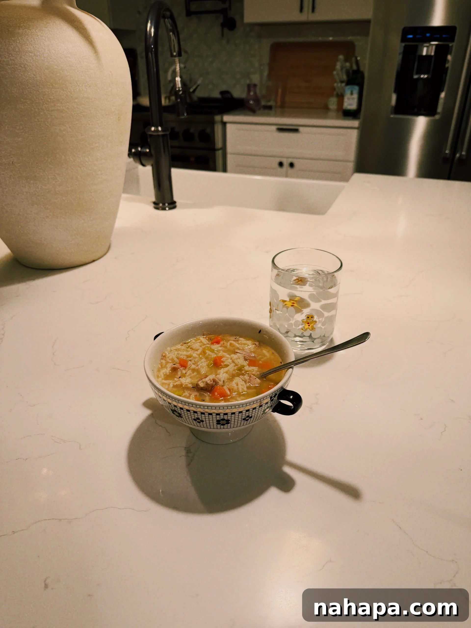 My Gluten-Free and Nightshade-Free NYC Food Guide 4 A vibrant, healthy bowl of chicken and wild rice soup, garnished with fresh herbs, showcasing a comforting and nutritious meal.