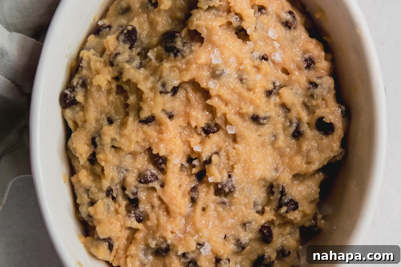 High protein cookie dough in a pink dish.