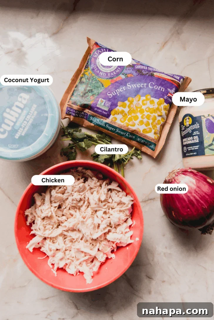 Mexican Street Corn Chicken Salad Recipe for Summer BBQs 4 All the ingredients for making street corn chicken salad laid out on a counter before cooking.